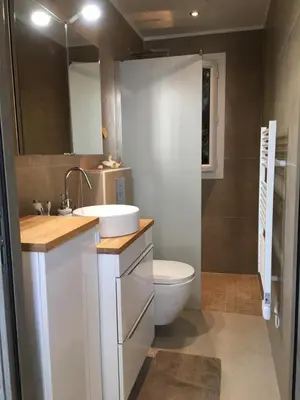 a bathroom with a white sink and a toilet at Cannes congrès in Cannes