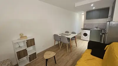 a small apartment with a kitchen and a living room at Studio à Cannes La Bocca in Cannes