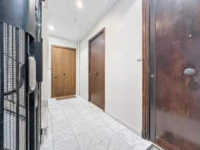 a hallway with two doors and a tile floor at INTUITION - 2 pieces - Cannes Carre d or in Cannes
