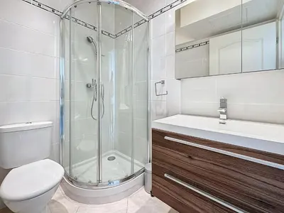 a bathroom with a shower and a toilet and a sink at Intuition 2 lits 2'' Croisette et Palais des Festivals in Cannes