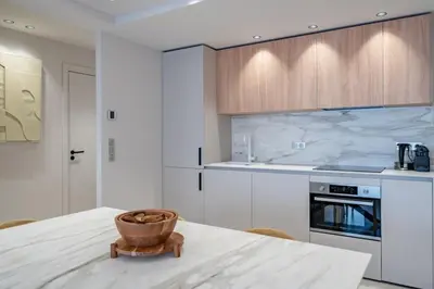 a kitchen with a table with a bowl on it at Beautiful 3 bedroom fully renovated in Cannes
