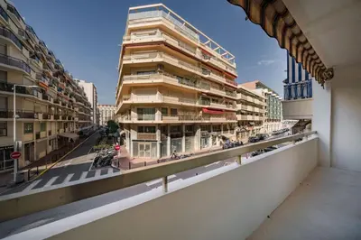 a view of a tall building from a balcony at Beautiful 3 bedroom fully renovated in Cannes