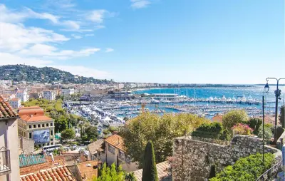 a view of a city with boats in the water at Nice Apartment In Cannes With Wifi in Cannes