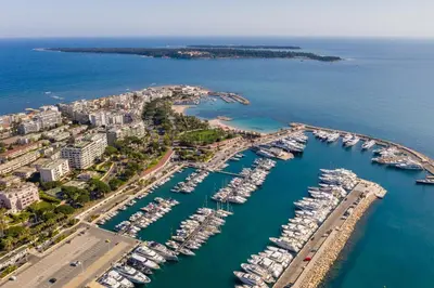 an aerial view of a harbor with boats in the water at REF 1943 - Cannes Centre - Apartment for rent in Cannes