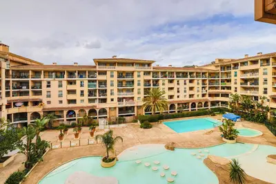 an aerial view of a large apartment building with a pool at Le Cannes Beach 408 - cosy Balcon Piscine Netflix in Cannes