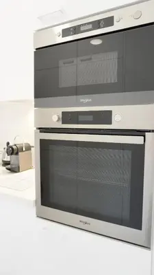 a microwave oven sitting on top of a stove at Proche Palais Des Festivals - Croisette,Studio Bella - Palmazur Vacances in Cannes