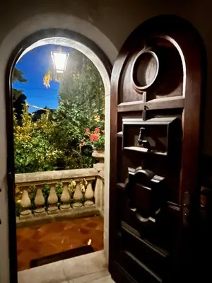 a door leading into a room with a window at Villa Tricia Cannes in Cannes