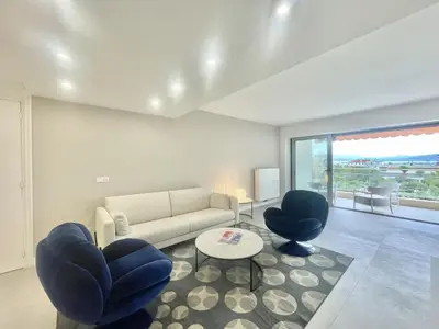 a living room with a couch and two chairs at Verdalia luxury 3 bedroom by Welcome to Cannes in Cannes