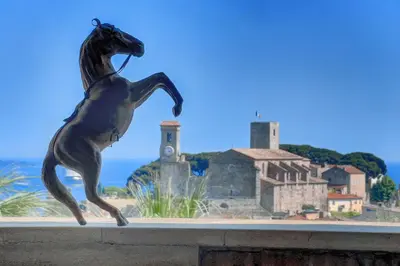 a statue of a horse on top of a wall at Studio Suquet Near Palais Et Plages in Cannes