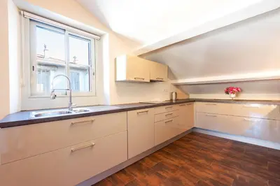 a kitchen with a sink and a window at Exquisite 2-Br apartment 3 minutes from la Croisette in Cannes