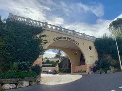 an entrance to a building with an archway at Le cannois in Cannes