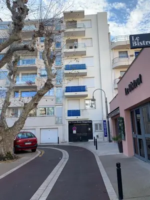 a car parked in front of a building at Le Petit Magellan by Welcome to Cannes in Cannes
