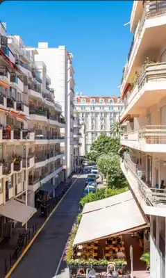 a street in a city with tall buildings at Luxurious 3Bedroom 2 BATH 110 m Apartment Adjoining Hotel Martinez Beachfront in Cannes