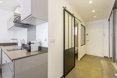 a kitchen with white walls and a counter top at Superbe T2 lumineux dans le centre CIO1899 in Cannes