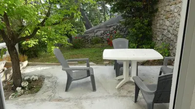 a swimming pool with some chairs at Bas de villa prestations haut de gamme in Vallauris