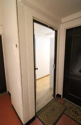an empty room with a door and a hallway at Le Borniol ! Idéal ! Congrès! Central! lumineux! in Cannes