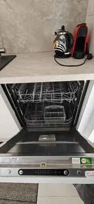 an oven with its door open on a counter at L'Hippocampe du Palm Beach in Cannes