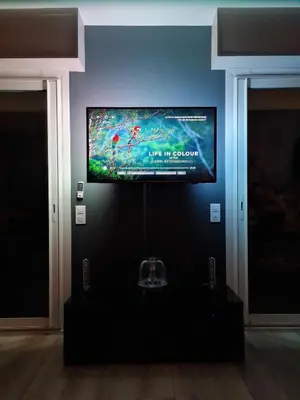 a flat screen tv on a wall in a room at Western Cannes - Panoramic View in Cannes