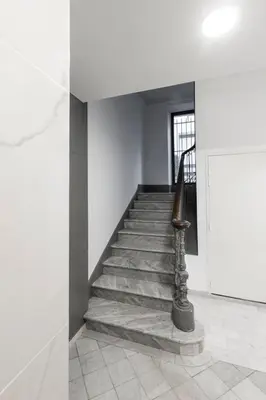 a staircase in a building with a stair case at Suite Carla - Superbe appartement à Cannes in Cannes