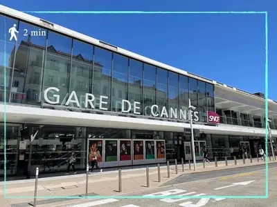 a building with a sign on the side of it at Suite Carla - Superbe appartement à Cannes in Cannes