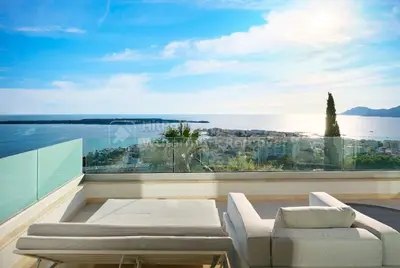a living room with a view of the ocean at Cannes villa 6 chambres - Elisabeth in Cannes