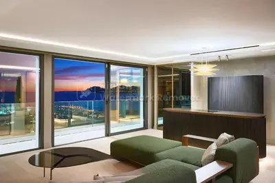 a living room with a couch and a television at Cannes villa 6 chambres - Elisabeth in Cannes