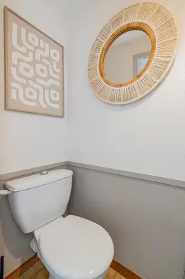 a bathroom with a white toilet and a mirror at 16 FORV - Apartment for 4 people City center - 300m Palais in Cannes
