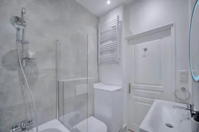 a bathroom with a shower and a toilet and a sink at Oasis du Sud 4 beds and 4 baths 10 min from Palais in Cannes
