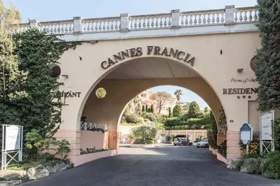 an archway with the entrance to a carvers franciselemetery at Stunning condo with SEA VIEW Balcony & SWIMMING POOL in Cannes