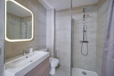 a bathroom with a toilet and a sink and a shower at Studio Moderne BALCON, proche FORVILLE- CENTRE CANNES A0B198 in Cannes