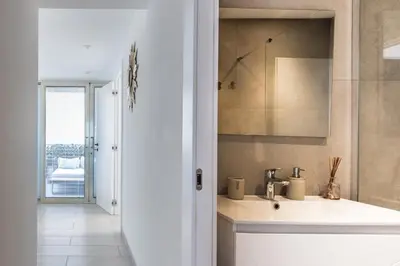 a bathroom with a sink and a mirror at Hypercentre - Palais - Croisette - Plage - CI in Cannes