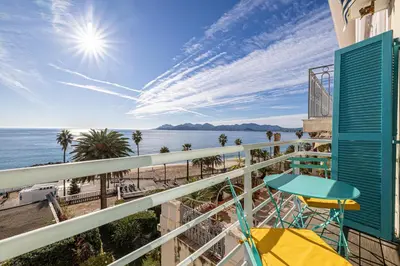 a balcony with a view of the ocean at 49 CLEM - Superbe appartement 2 chambres 4 pers avec vue mer in Cannes