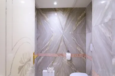 a bathroom with a shower with a toilet in it at Rare Penthouse - Vue panoramique in Cannes
