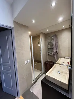 a bathroom with a shower and a sink at dans le quartier historique du suquet idéal congres et vacances in Cannes
