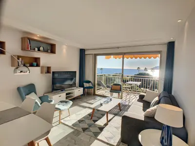 a living room with a view of the ocean at Superbe vue mer terrasse - 218L MISS in Cannes