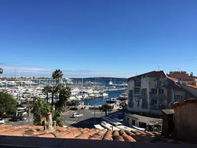 a view of a harbor with boats in the water at Cocoon'in Cannes Le Suquet in Cannes