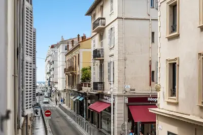 a street in the city with buildings at Cannes heart, 3 BR, 3 Bath, 100m Palais & beach in Cannes