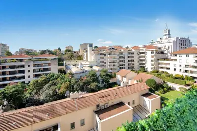 a view of a city with buildings and trees at The Jungle - Jacuzzi, Sauna & Projector in Cannes