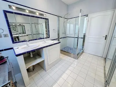 a bathroom with two sinks and a shower at Beautiful 2 bedroom bourgeois style Antibes 333 in Cannes