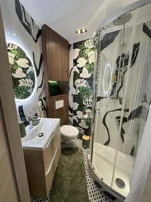 a bathroom with a shower and a sink and a toilet at Le cœur de Cannes in Cannes