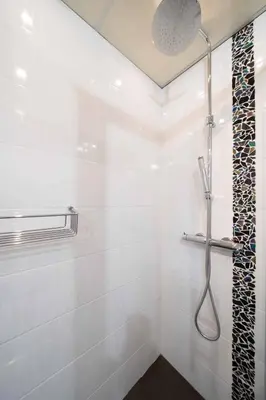 a bathroom with a shower with a shower head at Ciel d Azur avec terrasse en plein centre près de la Croisette in Cannes