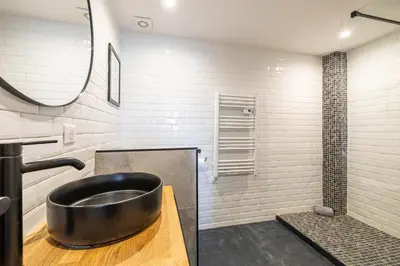 a bathroom with a large bowl sink and a shower at 5 CARNOT - Beautiful apartment, 4 people, 150m from Palais des Festivals in Cannes