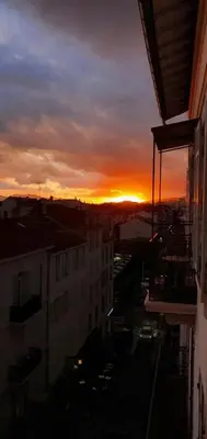 a sunset over a city with buildings and a city at 06CJ Beautiful apartment in the heart of Cannes in Cannes
