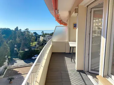 a balcony with a view of a street at Superbe 2 pièces 344L Jol in Cannes