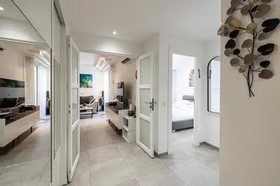 a large room with a bedroom and a bathroom at Modern 1 bedrm apt with balcony - Cannes-Croisette in Cannes