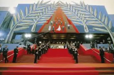 a group of people standing on a red carpet at Emplacement idéal 450 métres du Palais croisette plage in Cannes