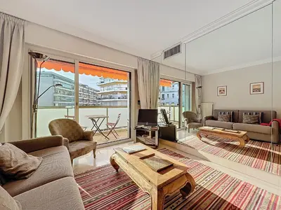 a living room with a couch and a table at Intuition - 2 personnes - Le Fragonard in Cannes