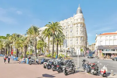 a group of motorcycles parked on a city street at Nice studio for two close to the beaches of Cannes in Cannes