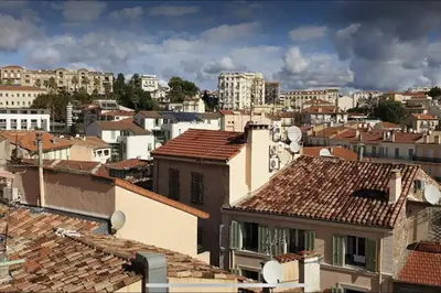 a view of a city with buildings and roofs at Le Suquet - Château - Palais - Seaview - WIFI in Cannes