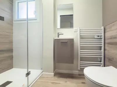 a bathroom with a shower and a sink at Le Marcellin by Winsome Destination in Cannes